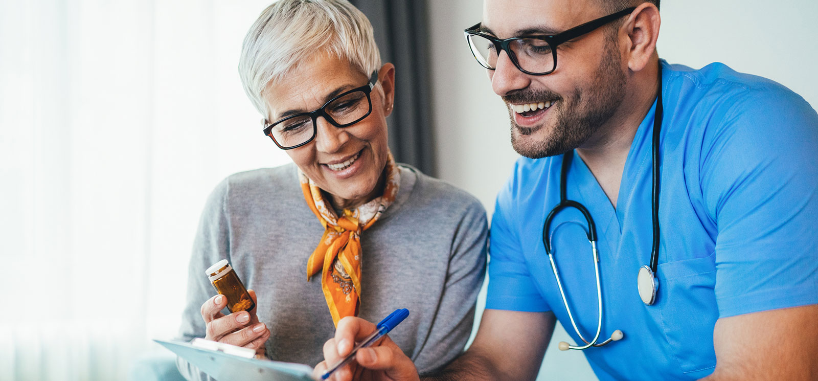 Mature woman meeting with nurse