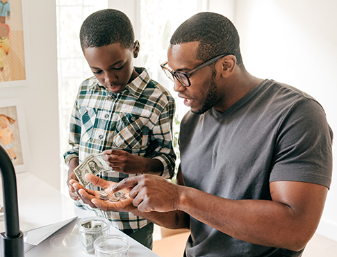 Father and son saving money